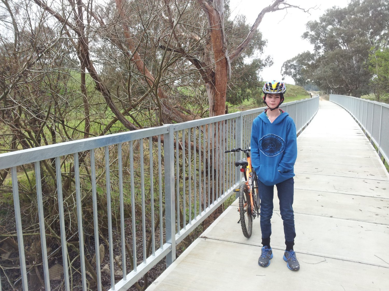 Kyle on a bridge crossing the Yea River. Great Victorian Rail Trail, Yea to Cheviot Tunnel. July 2013.