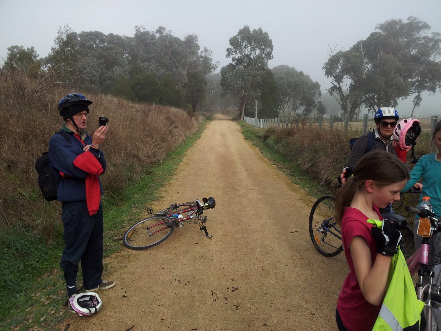Mark getting his photo subjects ready. The long straight sections were a pleasure to ride. The gradient is slight but the length can be tiring after a while. Great Victorian Rail Trail, Yea to Cheviot Tunnel. July 2013.