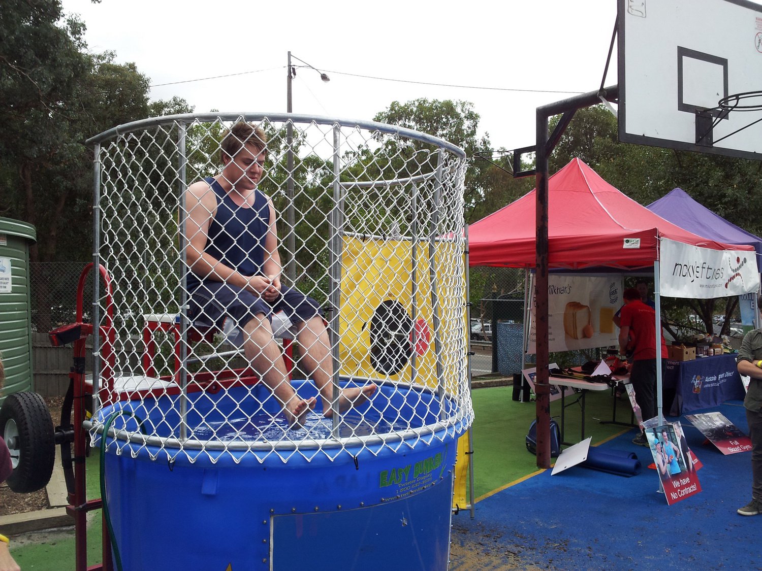 Josh about to get dunked. Eltham North PS Fete, March 2014.