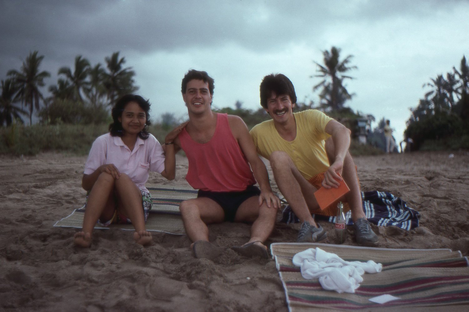 Marde, David Skinner and Michael Whiteley on Kuta beach. Bali vacation, October 1988.