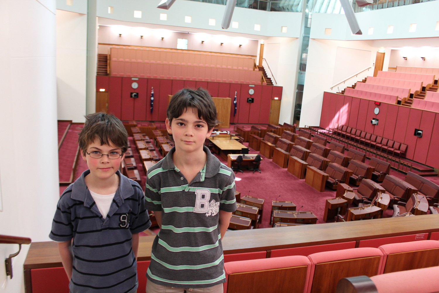 Kyle and Connor pose in the gallery of The Senate. There is also a photo of them in the  The House of Representatives, but I like the red better than the green colour scheme.