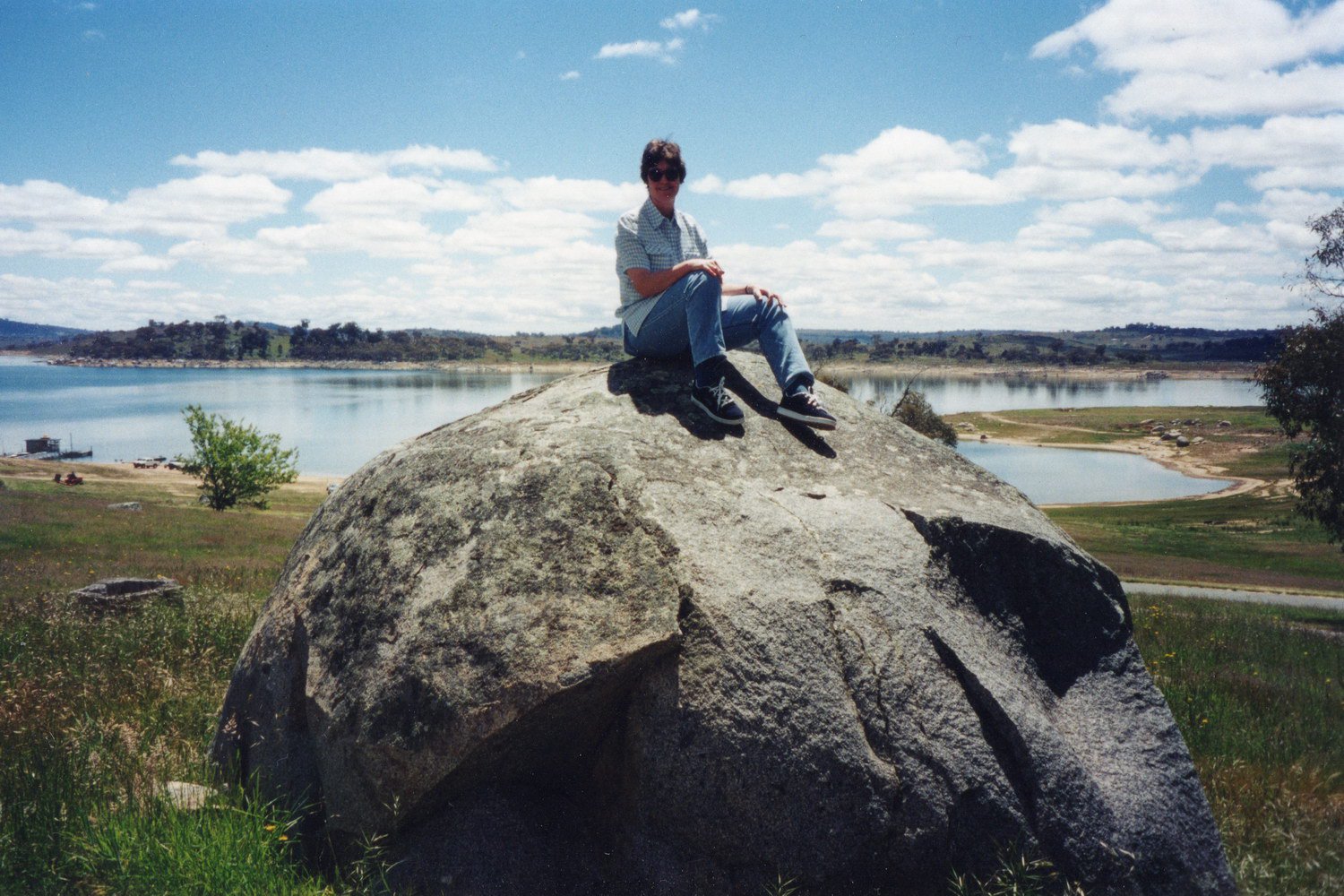 Karen on rock. Reproducing a childhood photo, taken at Lake Eucumbene. Snowy Mountains holiday, November 1999.