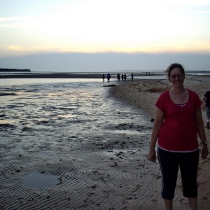 Karen on the beach at dusk