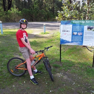 Kyle reading the information sign at Darlimurla