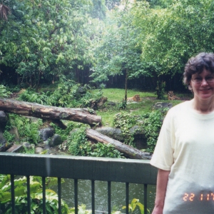 Karen in front of a tiger display
