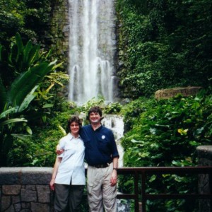 Karen and Glenn in front of a waterfall